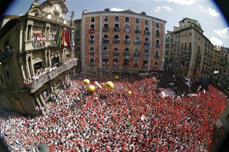 Tens of thousands of people packed Pamplona's main square in Pamplona, Spain Wednesday July 6, 2011 to celebrate the start of Spain's most famous bull-running festival with the annual launch of the "chupinazo" rocket.
